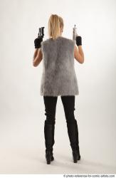 NIKOL STANDING POSE WITH TWO GUNS